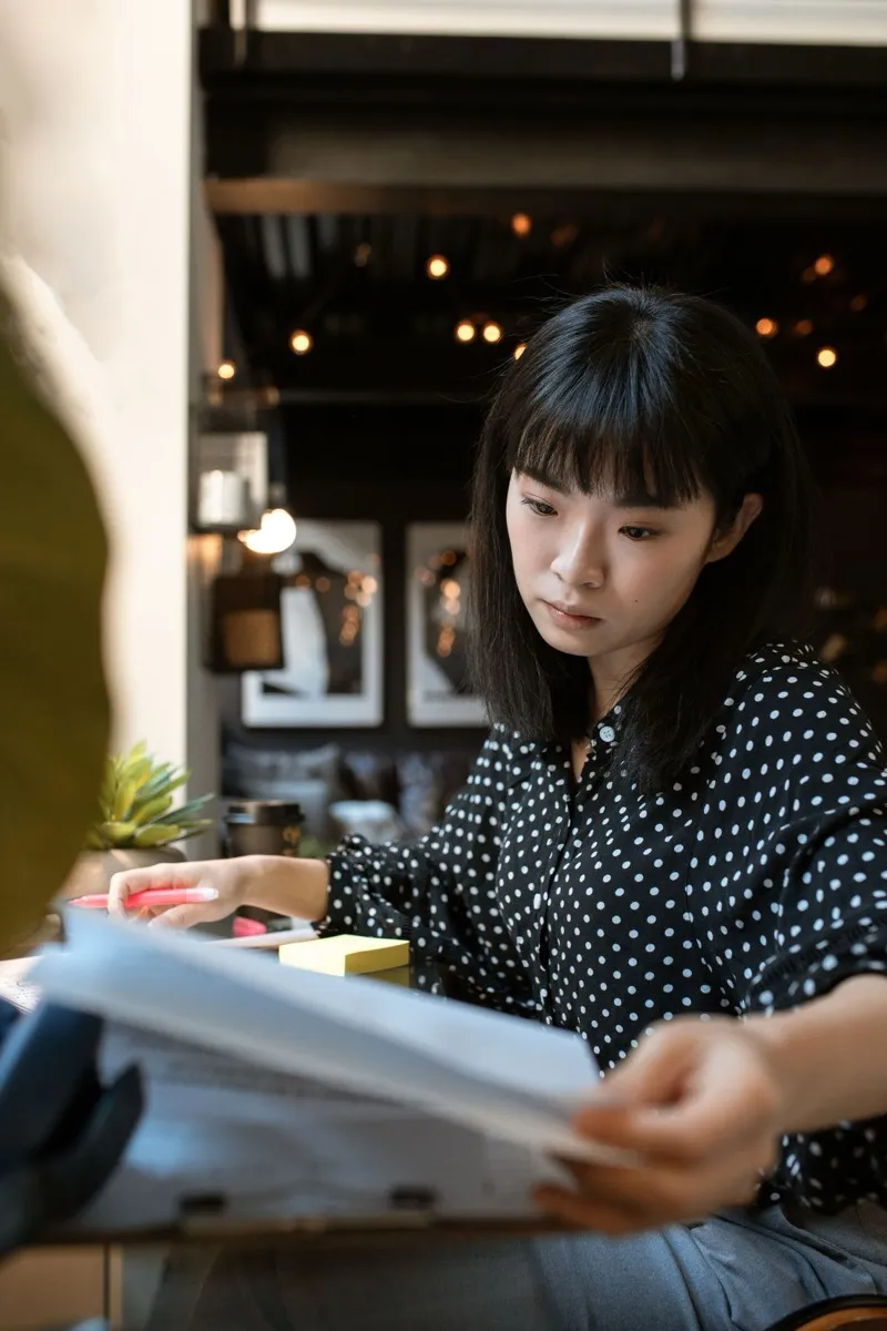 A business owner reviewing company paperwork