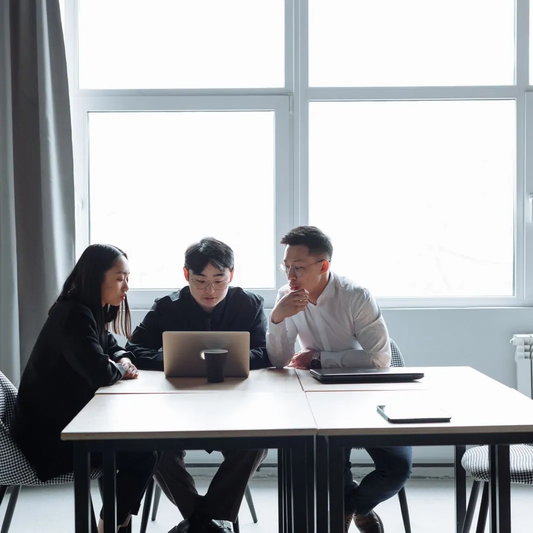 Founders reviewing their incorporation on a laptop